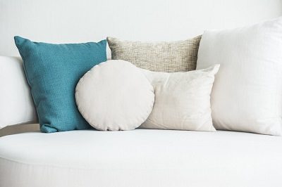 couch-with-cushions-blue_1203-1391